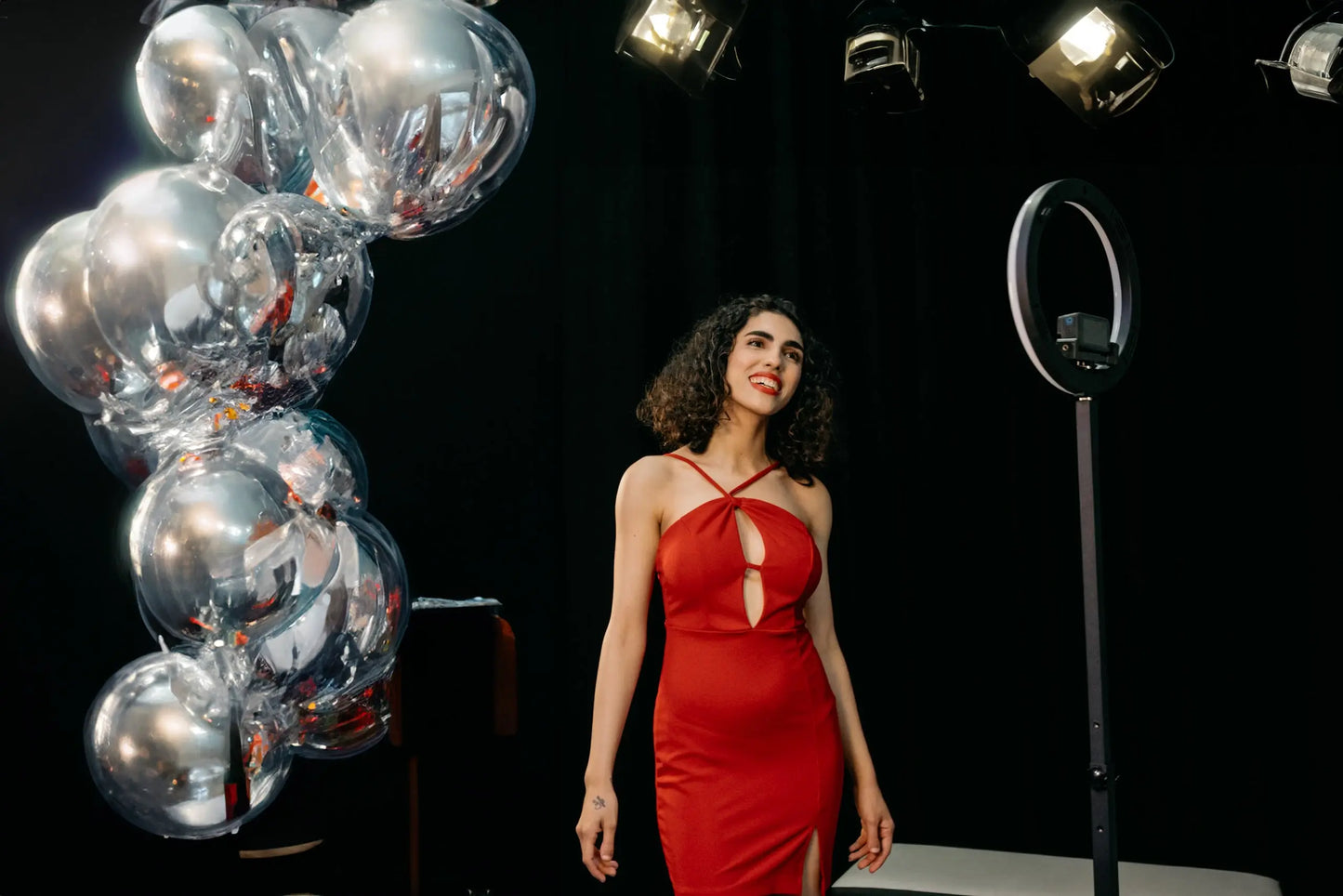 360 Photo Booth setup with colorful backdrop at an event